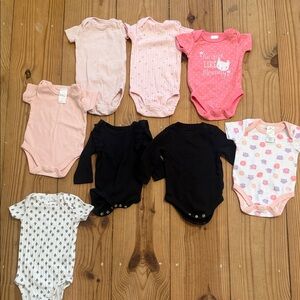 Assorted Pink and Black Baby Bodysuits
